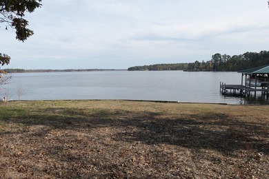 Spectacular lake front lot offering expansive water vistas and on The Patriot Golf Club At Grand Harbor in South Carolina - for sale on GolfHomes.com, golf home, golf lot