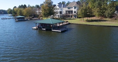 Spectacular lake front lot offering expansive water vistas and on The Patriot Golf Club At Grand Harbor in South Carolina - for sale on GolfHomes.com, golf home, golf lot