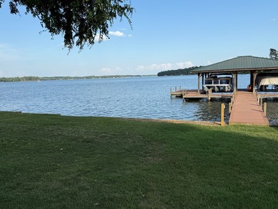 Spectacular lake front lot offering expansive water vistas and on The Patriot Golf Club At Grand Harbor in South Carolina - for sale on GolfHomes.com, golf home, golf lot