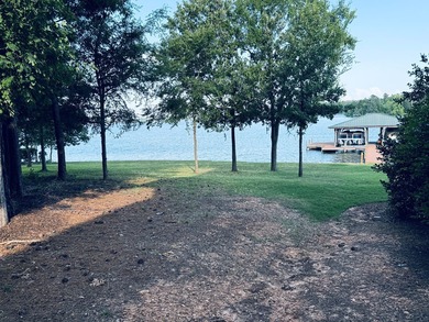 Spectacular lake front lot offering expansive water vistas and on The Patriot Golf Club At Grand Harbor in South Carolina - for sale on GolfHomes.com, golf home, golf lot