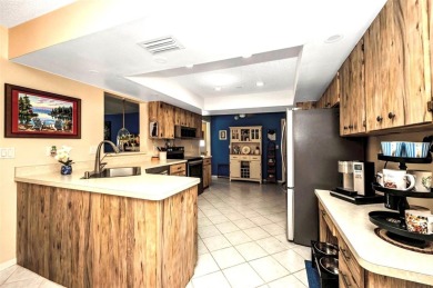 This immaculate and well-maintained home truly offers everything on Jacaranda West Country Club in Florida - for sale on GolfHomes.com, golf home, golf lot