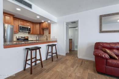 Indulge in the ultimate beach lifestyle in this 2/2 condo with on Oceans Golf Club in Florida - for sale on GolfHomes.com, golf home, golf lot