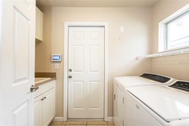 A rare block home in Grand Reserve, built by Viscomi on Grand Reserve Golf Course in Florida - for sale on GolfHomes.com, golf home, golf lot