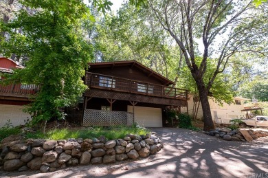 Make this your mountain home in the trees with all the modern on Adam Springs Golf Course in California - for sale on GolfHomes.com, golf home, golf lot