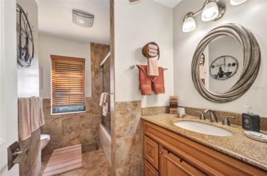 This immaculate and well-maintained home truly offers everything on Jacaranda West Country Club in Florida - for sale on GolfHomes.com, golf home, golf lot