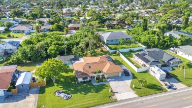 This immaculate and well-maintained home truly offers everything on Jacaranda West Country Club in Florida - for sale on GolfHomes.com, golf home, golf lot