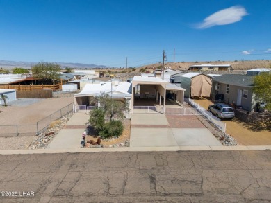 Enjoy Beautiful Lake & Mountain Views From Your Roof Deck With on The Refuge Golf and Country Club in Arizona - for sale on GolfHomes.com, golf home, golf lot