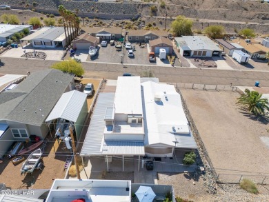 Enjoy Beautiful Lake & Mountain Views From Your Roof Deck With on The Refuge Golf and Country Club in Arizona - for sale on GolfHomes.com, golf home, golf lot