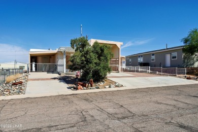 Enjoy Beautiful Lake & Mountain Views From Your Roof Deck With on The Refuge Golf and Country Club in Arizona - for sale on GolfHomes.com, golf home, golf lot