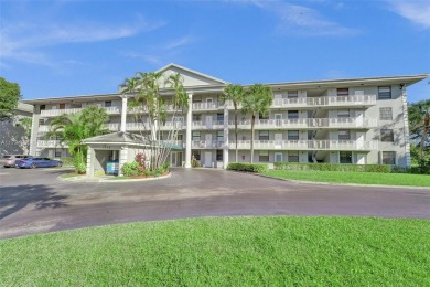 THIS 2 BEDROOM 2 BATHROOM WHITEHIALL 1 CONDO IS LOCATED IN A on Pine Island Ridge Country Club in Florida - for sale on GolfHomes.com, golf home, golf lot