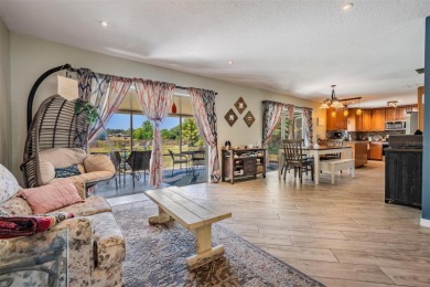 Welcome to this beautifully maintained 3-bedroom, 2-bathroom on Oak Hills Country Club in Florida - for sale on GolfHomes.com, golf home, golf lot