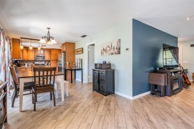 Welcome to this beautifully maintained 3-bedroom, 2-bathroom on Oak Hills Country Club in Florida - for sale on GolfHomes.com, golf home, golf lot
