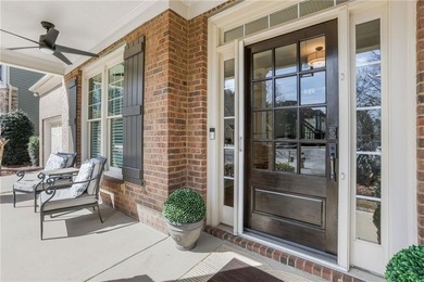 With beautiful curb appeal and tucked on a quiet cul-de-sac in on Windermere Golf Club in Georgia - for sale on GolfHomes.com, golf home, golf lot