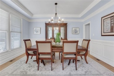 With beautiful curb appeal and tucked on a quiet cul-de-sac in on Windermere Golf Club in Georgia - for sale on GolfHomes.com, golf home, golf lot