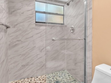 Spacious and bright 2-bedroom, 2-bath corner unit located in the on Colony West Country Club in Florida - for sale on GolfHomes.com, golf home, golf lot