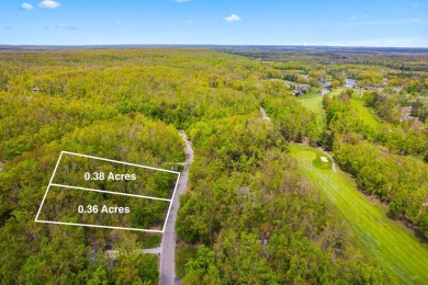 Escape to the beauty of Michaywe with this .74-acre wooded on Mountain Lake Golf Club in Michigan - for sale on GolfHomes.com, golf home, golf lot