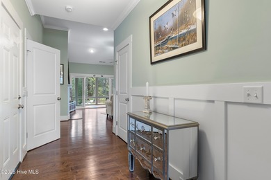 This home was featured in the 2014 Parade of Homes. Situated on on Members Club At St. James Plantation in North Carolina - for sale on GolfHomes.com, golf home, golf lot