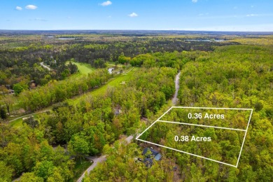 Escape to the beauty of Michaywe with this .74-acre wooded on Mountain Lake Golf Club in Michigan - for sale on GolfHomes.com, golf home, golf lot