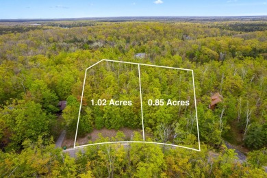Escape to the beauty of Michaywe with this 1.87-acre wooded on Michaywe Pines Course in Michigan - for sale on GolfHomes.com, golf home, golf lot
