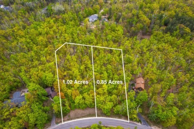 Escape to the beauty of Michaywe with this 1.87-acre wooded on Michaywe Pines Course in Michigan - for sale on GolfHomes.com, golf home, golf lot