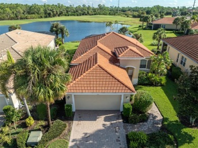 This stunning WCI-built  home offers a picturesque view from on Venetian Golf and River Club in Florida - for sale on GolfHomes.com, golf home, golf lot