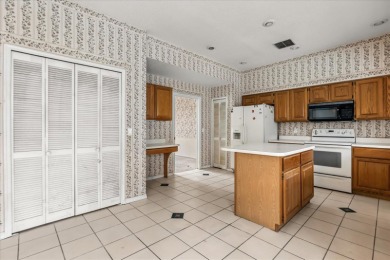 **SELLER IS PREPARED TO REPLACE THE ROOF PRIOR TO CLOSING** on Eastwood Golf Club in Florida - for sale on GolfHomes.com, golf home, golf lot