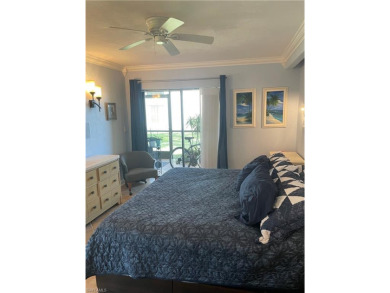 This inviting first-floor condo is an end-unit, providing extra on Riviera Golf Club in Florida - for sale on GolfHomes.com, golf home, golf lot