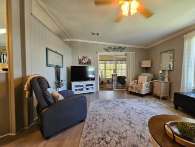 This home is in a 55+ resort-style manufactured home community on Big Cypress Golf and Country Club in Florida - for sale on GolfHomes.com, golf home, golf lot