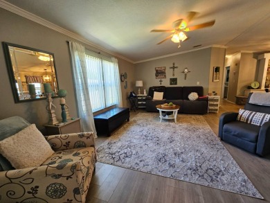 This home is in a 55+ resort-style manufactured home community on Big Cypress Golf and Country Club in Florida - for sale on GolfHomes.com, golf home, golf lot
