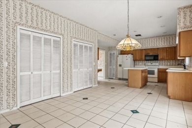 **SELLER IS PREPARED TO REPLACE THE ROOF PRIOR TO CLOSING** on Eastwood Golf Club in Florida - for sale on GolfHomes.com, golf home, golf lot