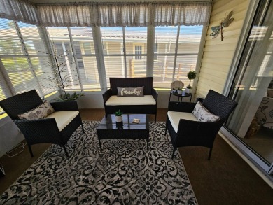 This home is in a 55+ resort-style manufactured home community on Big Cypress Golf and Country Club in Florida - for sale on GolfHomes.com, golf home, golf lot