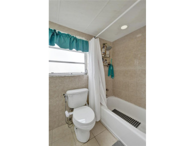 Remodeled 3/2 corner unit, the largest model in the building on  in Florida - for sale on GolfHomes.com, golf home, golf lot