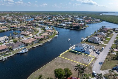 WATERFRONT LOT IN PGI W/SAILBOAT ACCESS & WIDE CANAL VIEW - This on Saint Andrews South Golf Club in Florida - for sale on GolfHomes.com, golf home, golf lot