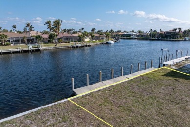 WATERFRONT LOT IN PGI W/SAILBOAT ACCESS & WIDE CANAL VIEW - This on Saint Andrews South Golf Club in Florida - for sale on GolfHomes.com, golf home, golf lot