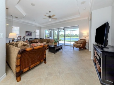 This stunning WCI-built  home offers a picturesque view from on Venetian Golf and River Club in Florida - for sale on GolfHomes.com, golf home, golf lot