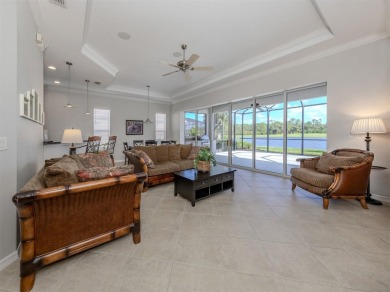 This stunning WCI-built  home offers a picturesque view from on Venetian Golf and River Club in Florida - for sale on GolfHomes.com, golf home, golf lot