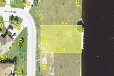 WATERFRONT LOT IN PGI W/SAILBOAT ACCESS & WIDE CANAL VIEW - This on Saint Andrews South Golf Club in Florida - for sale on GolfHomes.com, golf home, golf lot