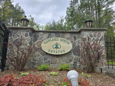1.5+/-Acre wooded buildable lot situated within Garland Lodge & on Garland Resort and Golf Club  in Michigan - for sale on GolfHomes.com, golf home, golf lot