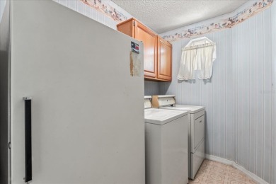 **SELLER IS PREPARED TO REPLACE THE ROOF PRIOR TO CLOSING** on Eastwood Golf Club in Florida - for sale on GolfHomes.com, golf home, golf lot