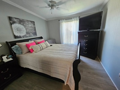 This home is in a 55+ resort-style manufactured home community on Big Cypress Golf and Country Club in Florida - for sale on GolfHomes.com, golf home, golf lot