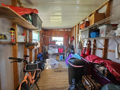 This home is in a 55+ resort-style manufactured home community on Big Cypress Golf and Country Club in Florida - for sale on GolfHomes.com, golf home, golf lot