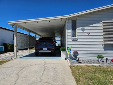 This home is in a 55+ resort-style manufactured home community on Big Cypress Golf and Country Club in Florida - for sale on GolfHomes.com, golf home, golf lot