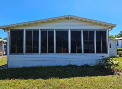 This home is in a 55+ resort-style manufactured home community on Big Cypress Golf and Country Club in Florida - for sale on GolfHomes.com, golf home, golf lot