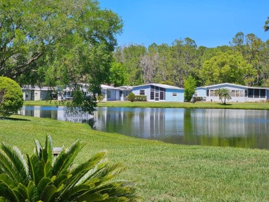 This home is in a 55+ resort-style manufactured home community on Big Cypress Golf and Country Club in Florida - for sale on GolfHomes.com, golf home, golf lot