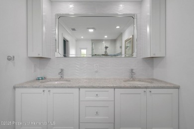 WOW, that is what you will be saying when you enter this fully on Timber Pines Golf Course in Florida - for sale on GolfHomes.com, golf home, golf lot