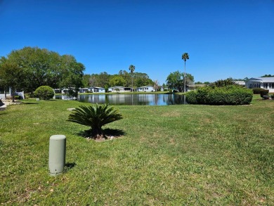 This home is in a 55+ resort-style manufactured home community on Big Cypress Golf and Country Club in Florida - for sale on GolfHomes.com, golf home, golf lot