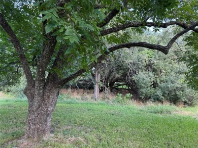 Great lot in Pecan Plantation at a great price. Across the on Pecan Plantation Country Club in Texas - for sale on GolfHomes.com, golf home, golf lot
