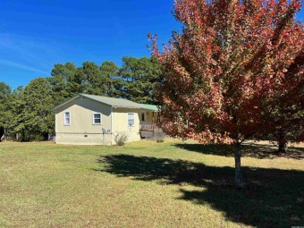 Located just minutes from Greers Ferry Lake and less than a mile on Red Apple Inn and Country Club in Arkansas - for sale on GolfHomes.com, golf home, golf lot