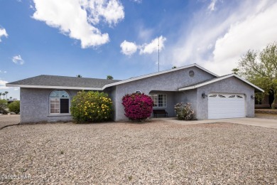 Welcome to 1811 Duel Dr. This original owner home is nestled on London Bridge Golf Course in Arizona - for sale on GolfHomes.com, golf home, golf lot