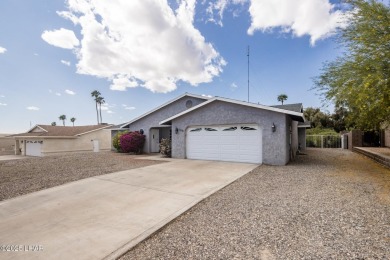 Welcome to 1811 Duel Dr. This original owner home is nestled on London Bridge Golf Course in Arizona - for sale on GolfHomes.com, golf home, golf lot